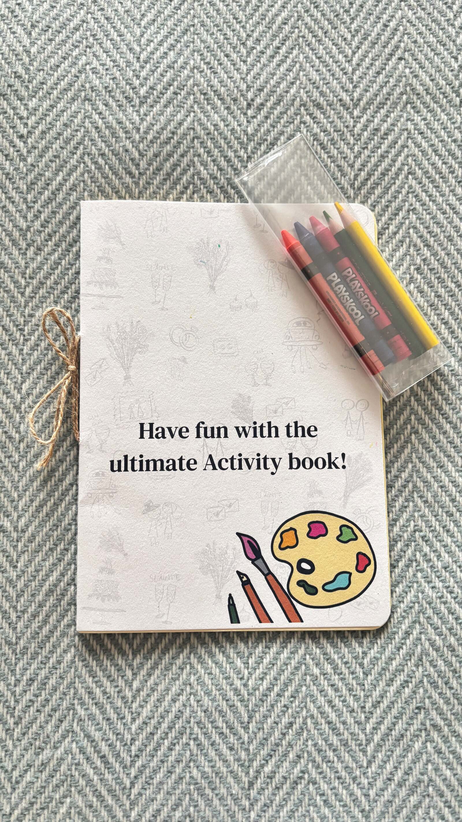 Handmade kids activity book with crayons